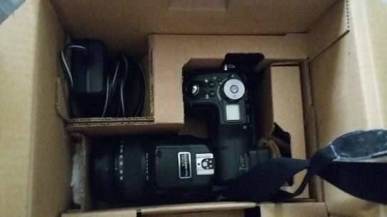 SLR Sony DSC-F828 with free 1 pair of any of the shoes (pic attached)