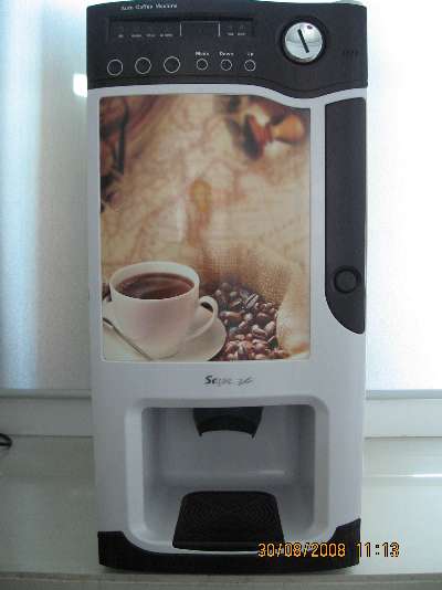coffee vending machine with brace an LED lights photo