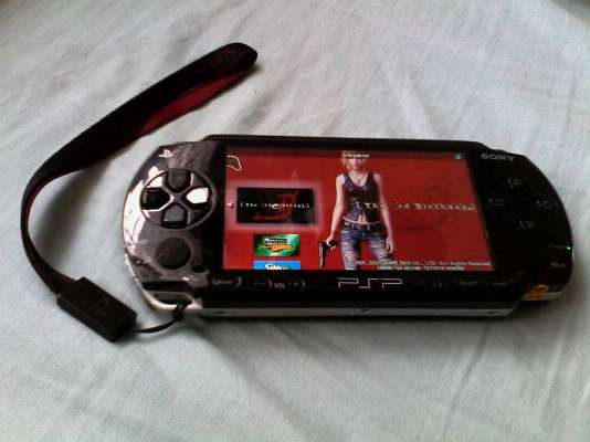 Sony PSP1000 (Black) loaded with games photo