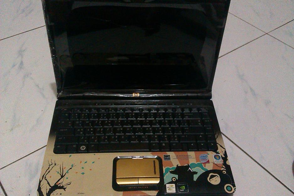 hp laptop dv2000 with 500 gb external hardrive photo