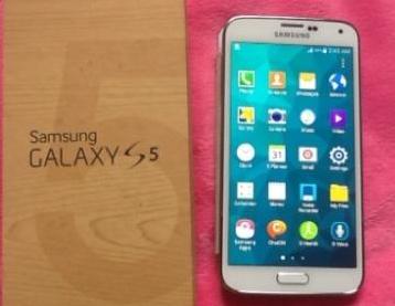 Samsung Galaxy S5 Factory Unlocked Complete photo