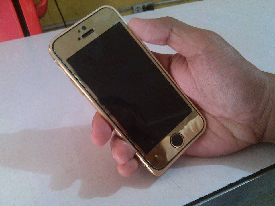 Selling iPhone 5 GOLD converted smile emoticon  32 GIG photo