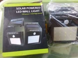 SOLAR POWERED LED WALL LIGHT WITH SENSOR FOR KENNEL USAGE