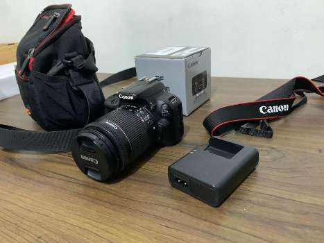 Canon 100D DSLR with 50mm lens