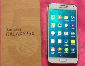 Samsung Galaxy S5 Factory Unlocked Complete photo