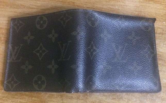 Slightly Used LV wallet photo