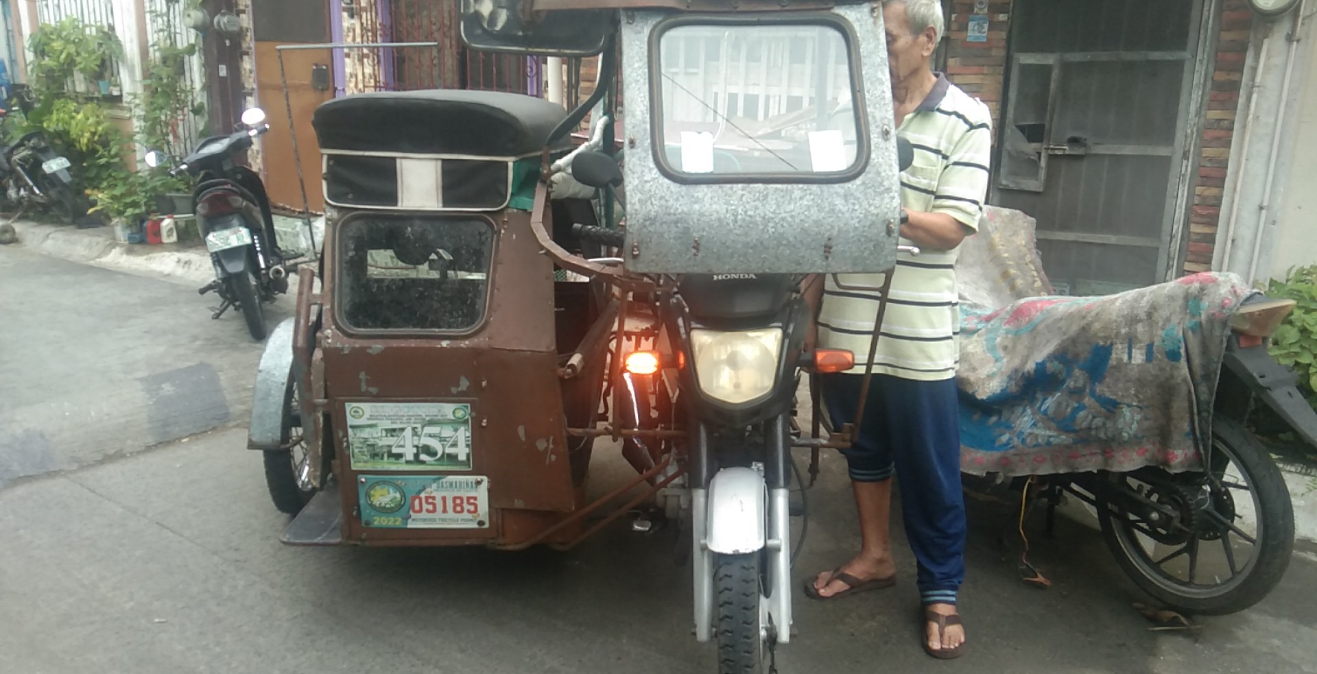 tricycle with franchise cative dasma. photo